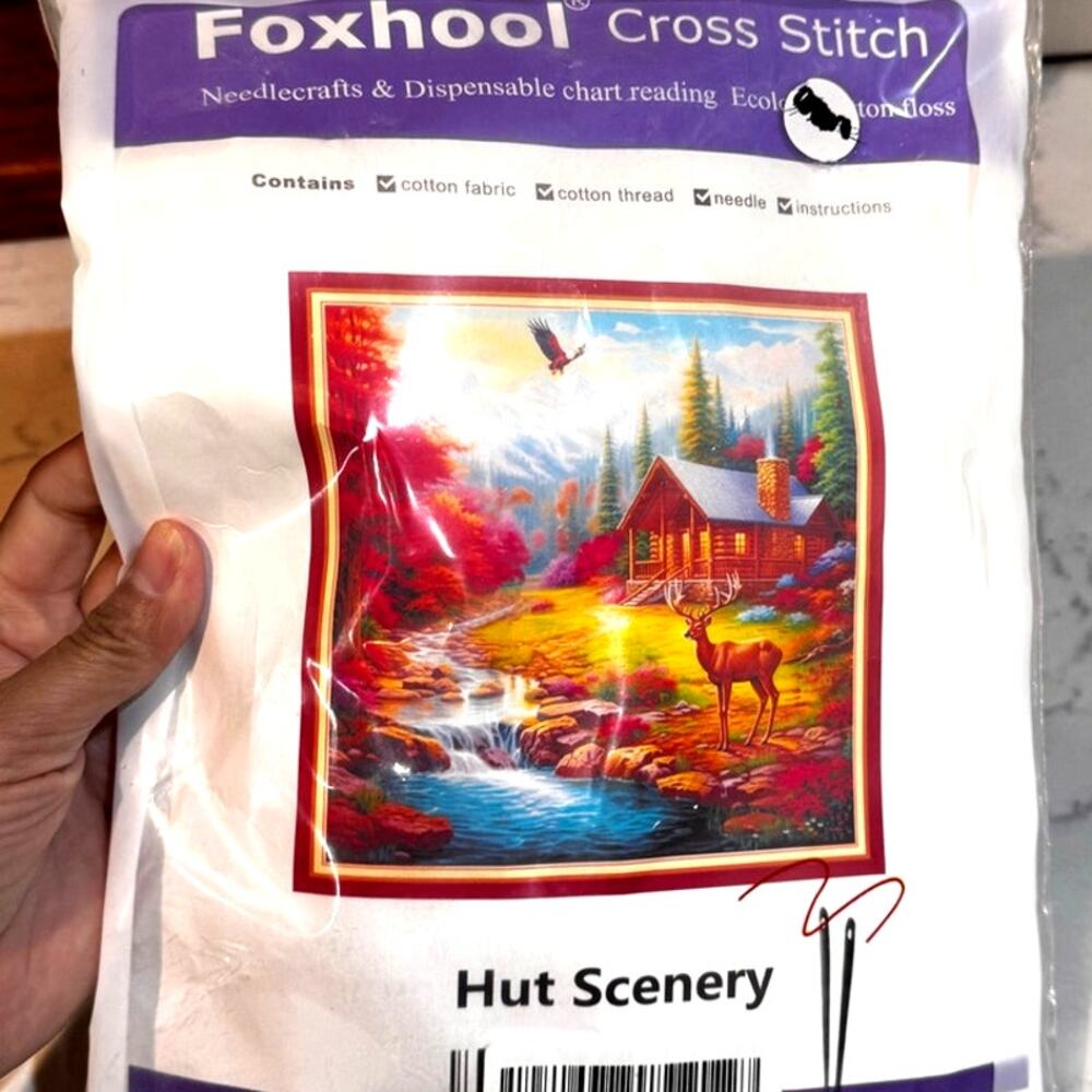 Foxhool Cross Stitch Kit Hut Scenery design with a cabin, deer, and waterfall